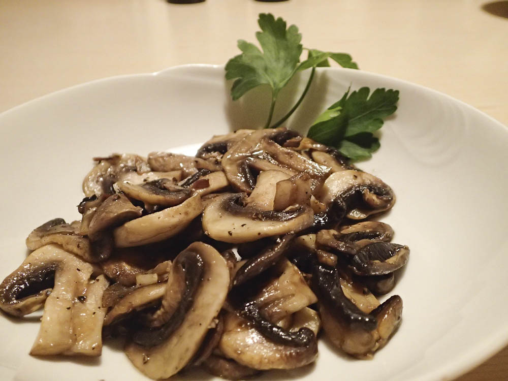 Vitlöksfrästa champinjoner